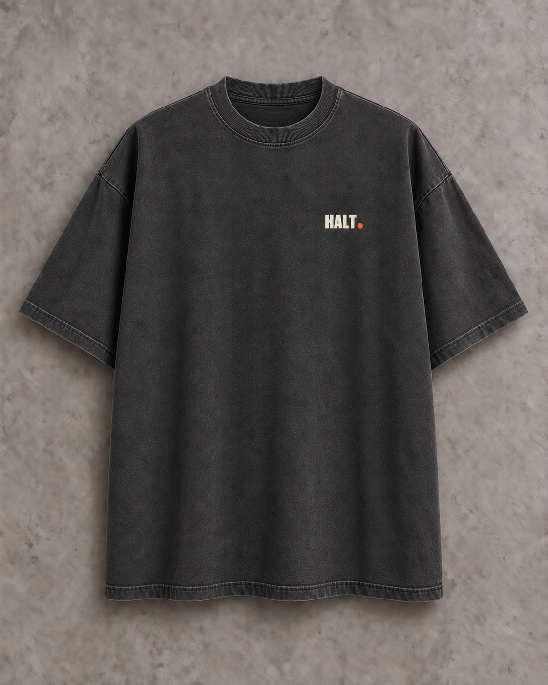 Front of HALT. washed charcoal oversized T-shirt with a small bone logo and coral dot on the left chest.